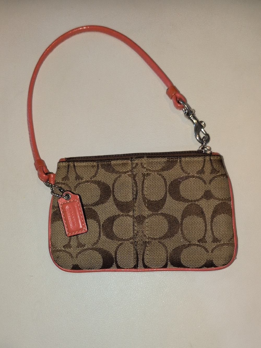 Coach Brown Signature Canvas Wristlet with Coral Trim - Picture 1 of 7